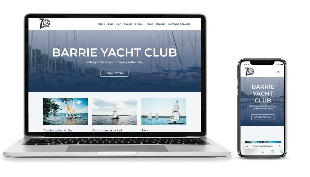 A laptop computer and phone side by side, showcasing the Barrie Yacht Club website.